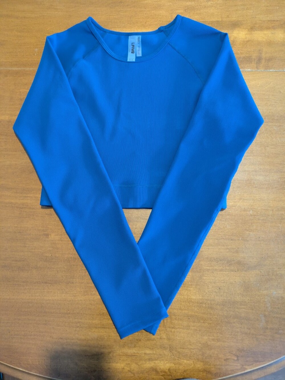 Simon's Cropped Long Sleeve Top in Vibrant Blue